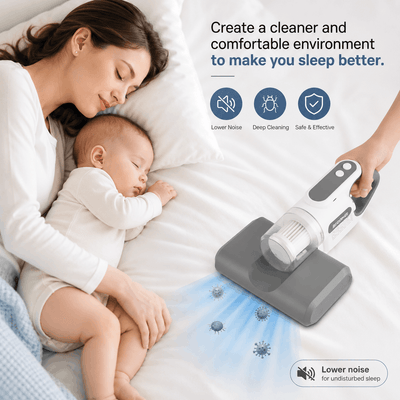 Woman and baby sleeping on a bed with a handheld vacuum cleaner cleaning the surface.