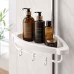A white shower shelf mounted on a metal shower rod, holding four toiletry bottles and a small jar in a bright bathroom setting. - thumbnail 4
