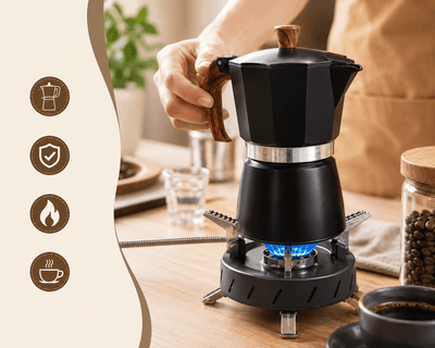 Black Moka pot espresso maker heating on a portable camping gas stove with blue flame