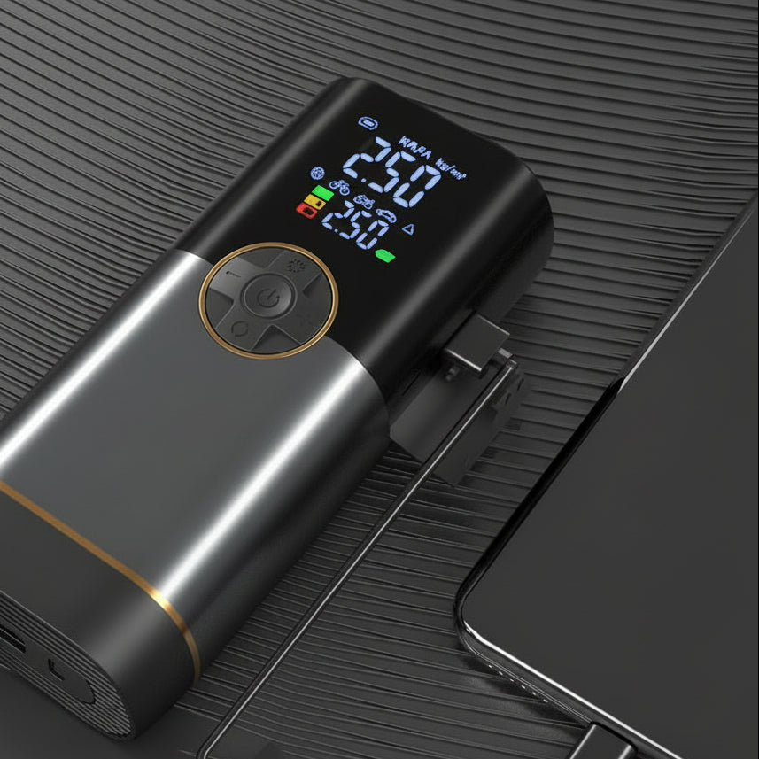 Black electronic device with digital display and USB cable on a dark surface At Aezoon