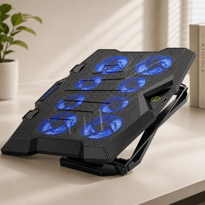 Black laptop cooling pad with blue LED lights on a desk