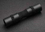 Black rolled-up mat on a textured dark surface
