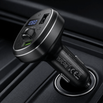 Car charger with digital display and multiple ports on a dark background