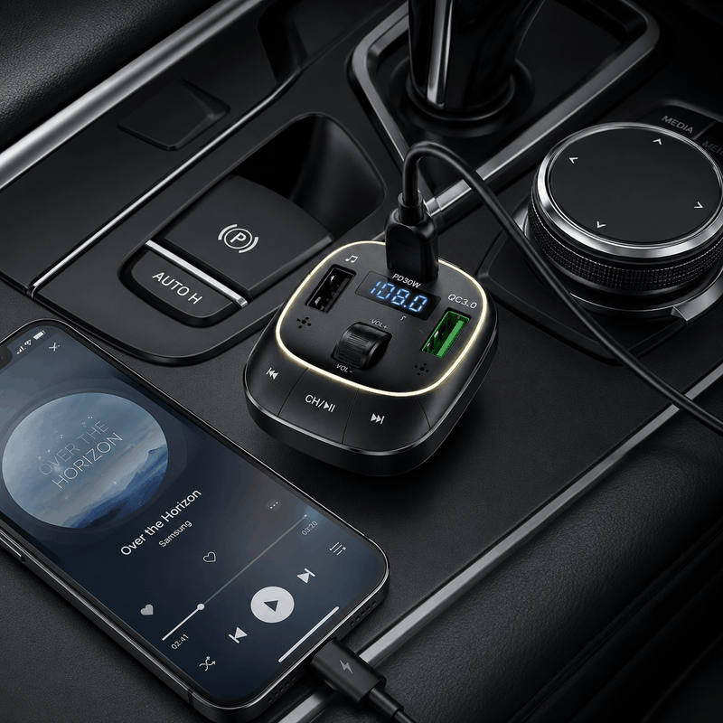 Car dashboard with a smartphone and dual USB car charger.