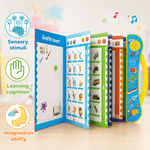Children's educational board with colorful pages and sensory stimuli on a wooden surface.