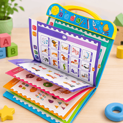 Colorful educational book for children on a wooden surface with toys around