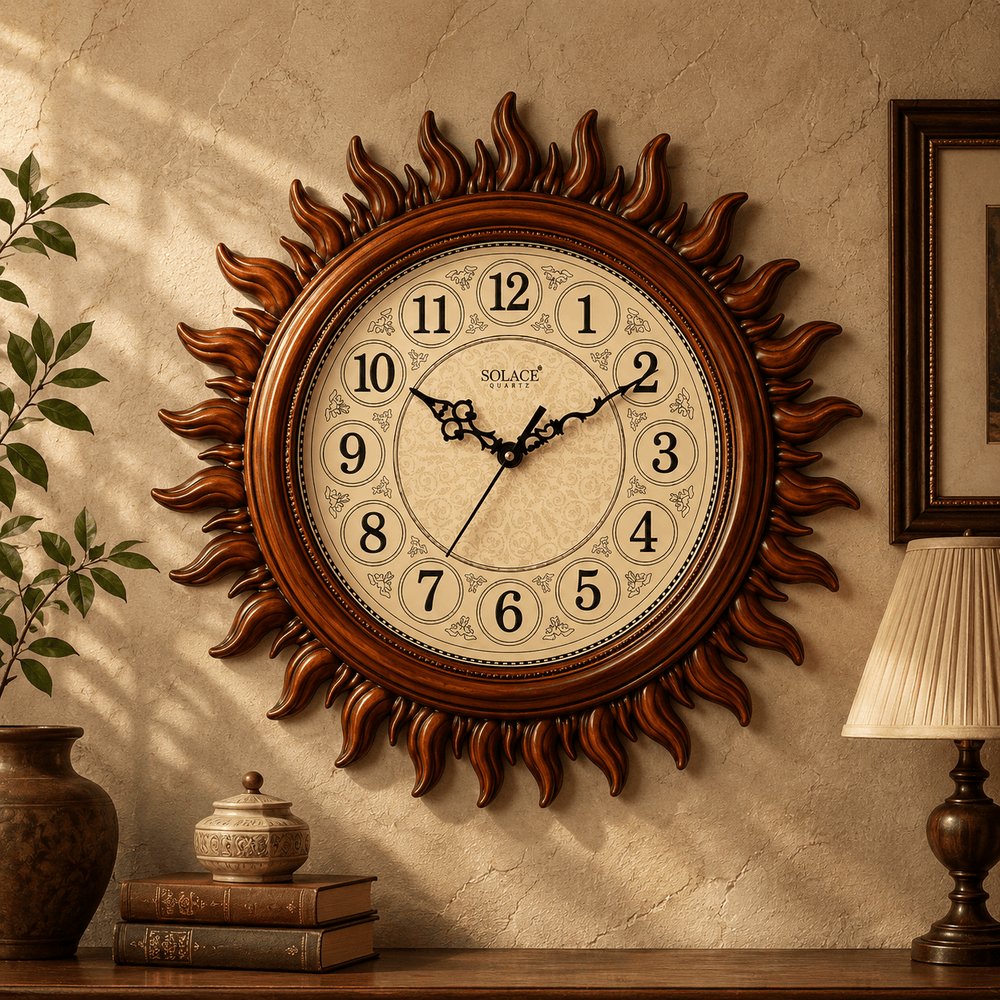 Decorative wall clock with sunburst design on a wall with a lamp and books in the background.