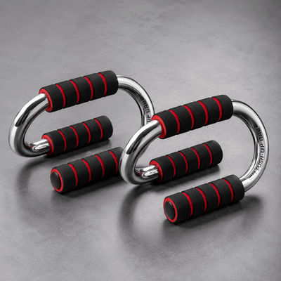 Pair of metallic hand grips with black and red handles on a gray background