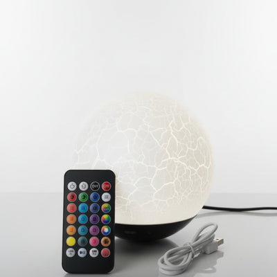 White LED night light with remote control on a white background