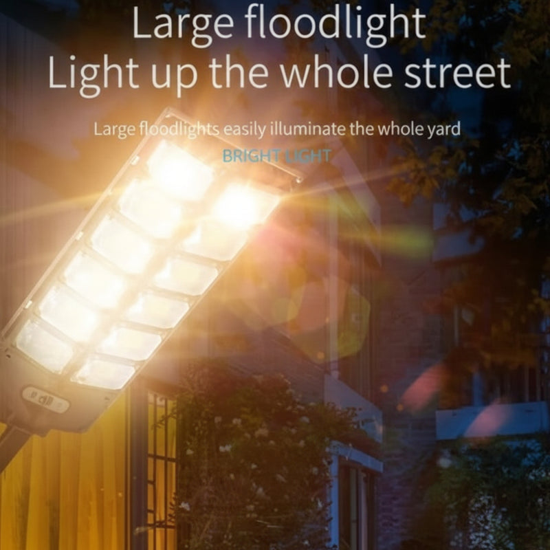 Large floodlight illuminating a street with text overlay At Aezoon