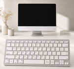 Sleek and portable universal wireless keyboard featuring a full QWERTY layout.