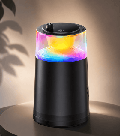 Starry sky car fragrance diffuser in a cup holder with a seven color LED glow effect