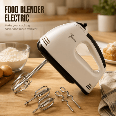White and black electric hand mixer on a kitchen counter with attachments and ingredients.