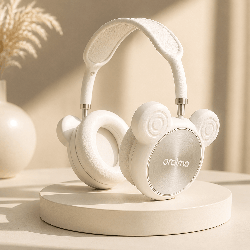 White headphones with 'oraimo' branding on a beige surface with a soft background