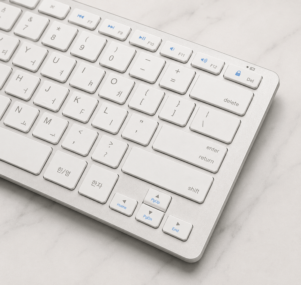 White keyboard on a light gray surface