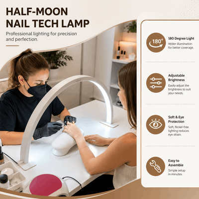 Woman getting a manicure with a half-moon nail tech lamp in a professional setting.