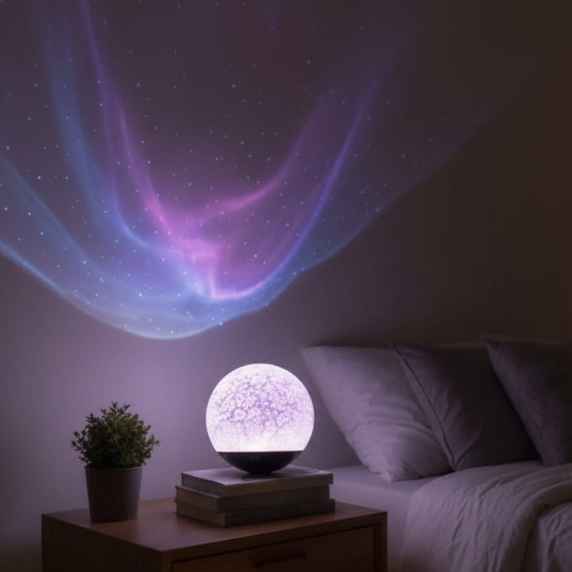 Decorative night light projecting a colorful nebula pattern on a wall above a bed.